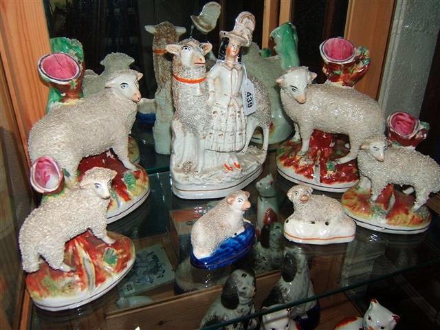 Appraisal: Various Staffordshire style figurines of sheep including two pairs of