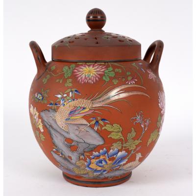 Appraisal: A Wedgwood 'Rosso Antico' potpourri urn and cover circa enamelled