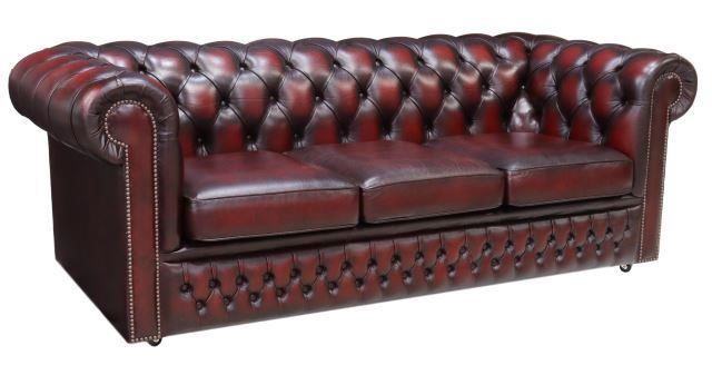 Appraisal: English Chesterfield three-seat sofa late th c in oxblood leather