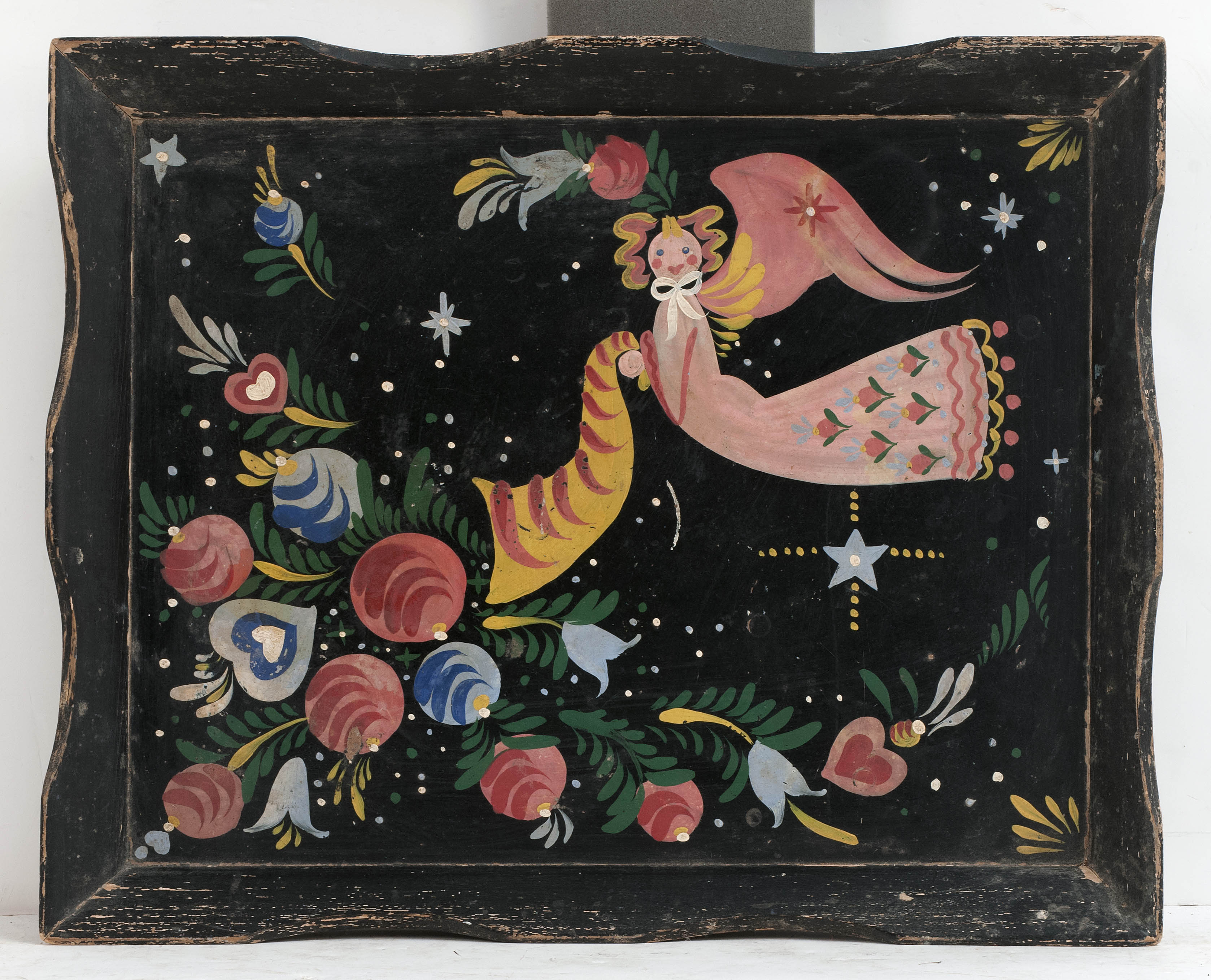 Appraisal: PAINT-DECORATED TRAY ATTRIBUTED TO PETER HUNT Angel and cornucopia design