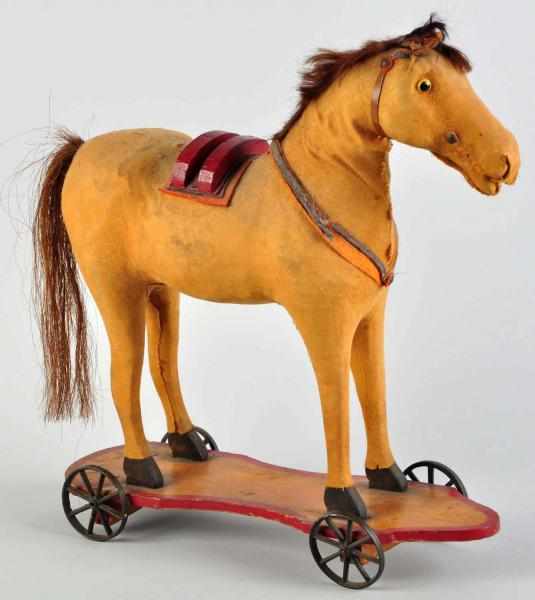 Appraisal: Large Hide-Covered Horse Pull Toy Horse on wooden platform with