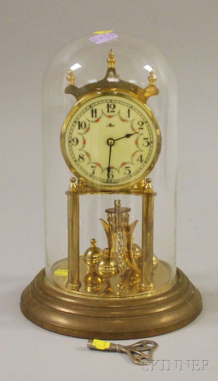 Appraisal: Brass -Day Clock Germany with glass dome and pendulum ht