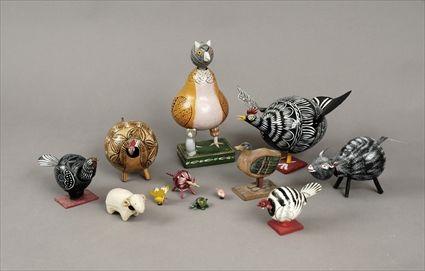 Appraisal: Twelve Painted Wood and Papier-M ch Bobbing-Head Animal Figures to