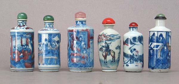 Appraisal: Six underglaze blue and copper red decorated snuff bottles Including