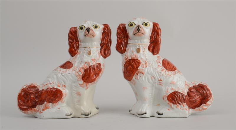 Appraisal: PAIR OF STAFFORDSHIRE MODELS OF SEATED SPANIELS Each with iron