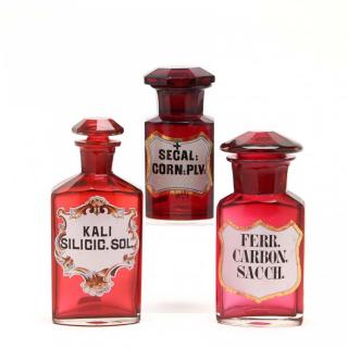 Appraisal: Group of Three Ruby Glass Apothecary Bottles the first is