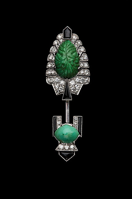 Appraisal: A TURQUOISE DIAMOND AND ONYX CLIQUET PIN POSSIBLY BY CARTIER