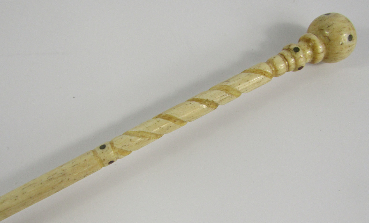 Appraisal: An early thC marine ivory cane with turned and spiral