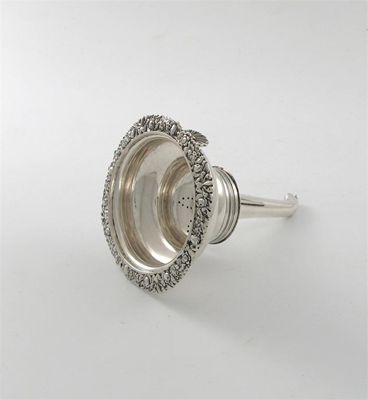 Appraisal: A George IV Scottish wine funnel with a shell tang