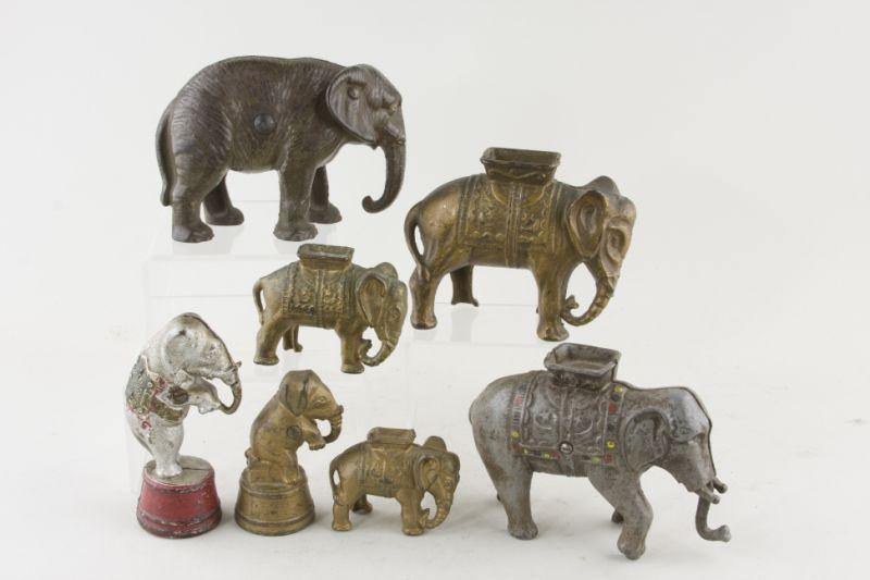 Appraisal: Cast Iron Elephant Banks standing elephants performing elephants x Various