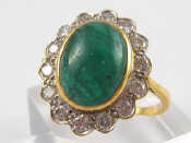 Appraisal: An carat gold cabochon emerald and diamond ring marked MM