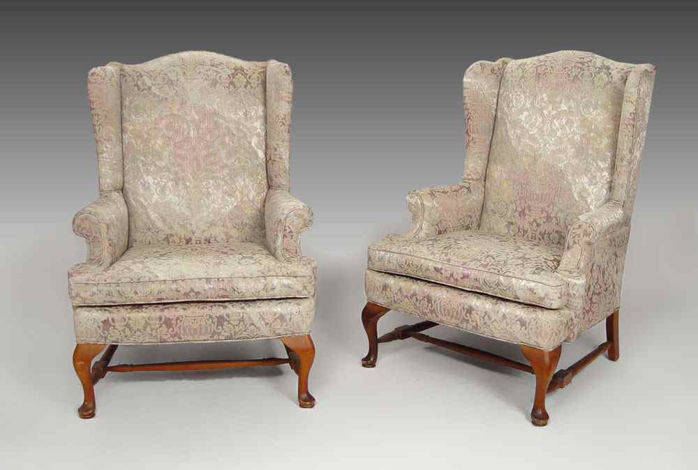 Appraisal: PAIR ROLL ARM HIGH WING BACK CHAIRS With Queen Ann