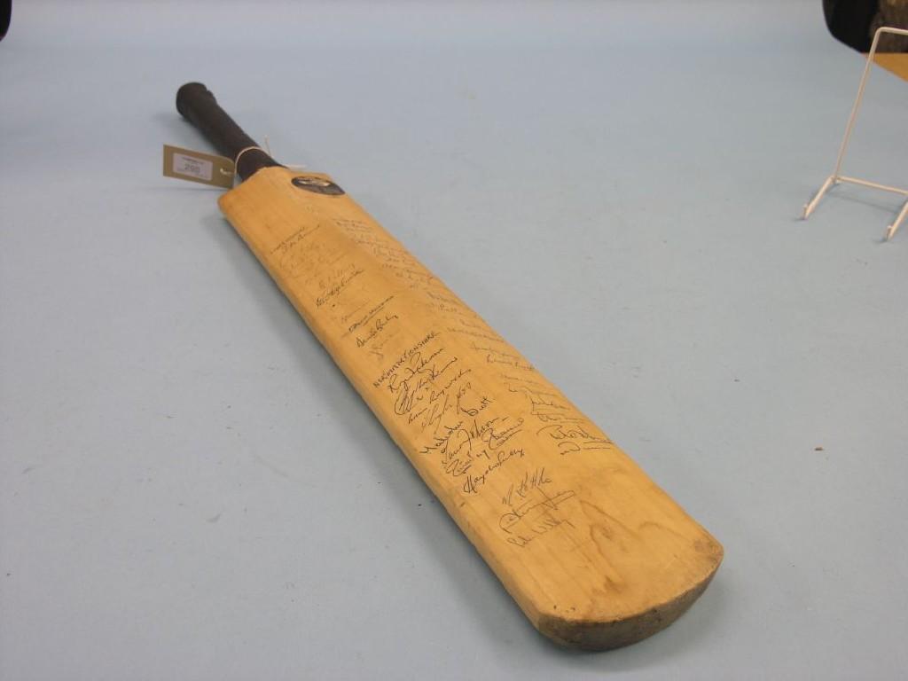 Appraisal: An autographed cricket bat signatures of England West Indies Lancashire