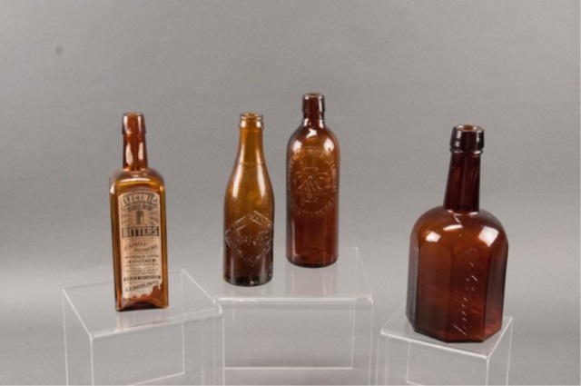 Appraisal: Collection of Four Glass Bottles Including an Electric Brand Bitters