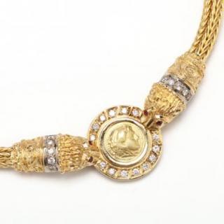 Appraisal: KT Coin and Gem Set Necklace necklace centered with a