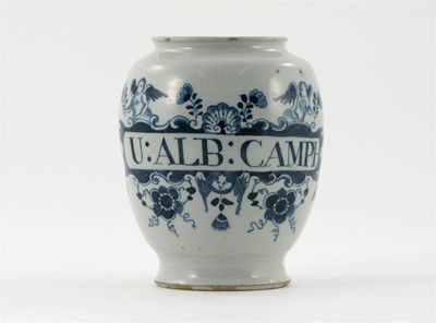 Appraisal: A Delft drug jar painted with angels holding flower stems