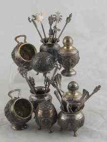 Appraisal: A quantity of Oriental white metal tests silver condiment pots