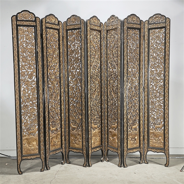 Appraisal: Chinese seven-panel wood screen with carved gilt openwork design of