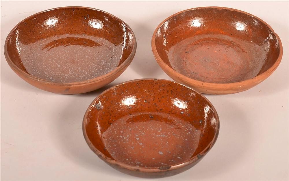 Appraisal: Set of Three PA Redware Glazed Pie Plates Set of