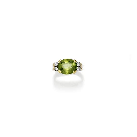 Appraisal: PERIDOT AND DIAMOND RING ca Yellow gold Decorative ring the