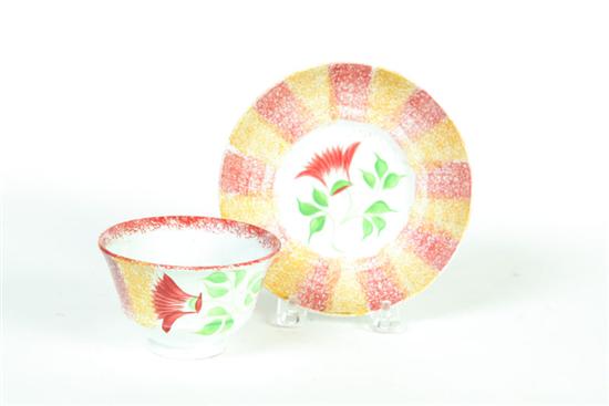 Appraisal: RAINBOW SPATTERWARE HANDLELESS CUP AND SAUCER England st quarter- th