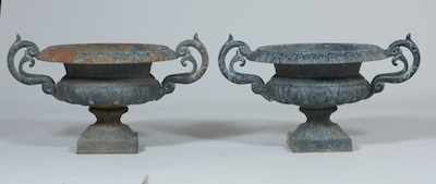 Appraisal: A Pair of Empire Style Iron Garden Urns Pair of