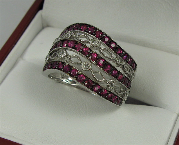 Appraisal: RUBY DIAMOND AND K WHITE GOLD RING set with round-cut