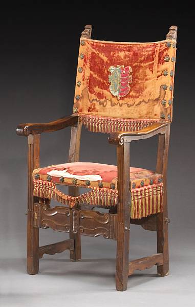 Appraisal: An Italian Baroque walnut armchair The rectangular velvet and needlework