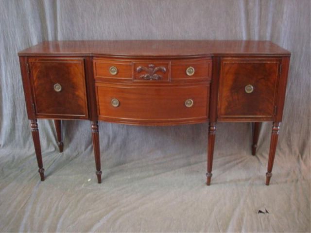 Appraisal: Sheraton Style Mahogany Server Nice quality with curved sides and