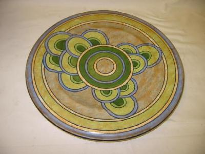 Appraisal: A FREDERICK RHEAD BURSLEM POTTERY CHARGER tube lined with geometric