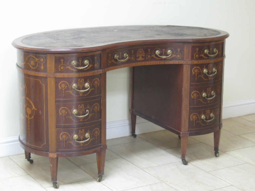 Appraisal: A th Century mahogany kidney shaped writing Desk with marquetry