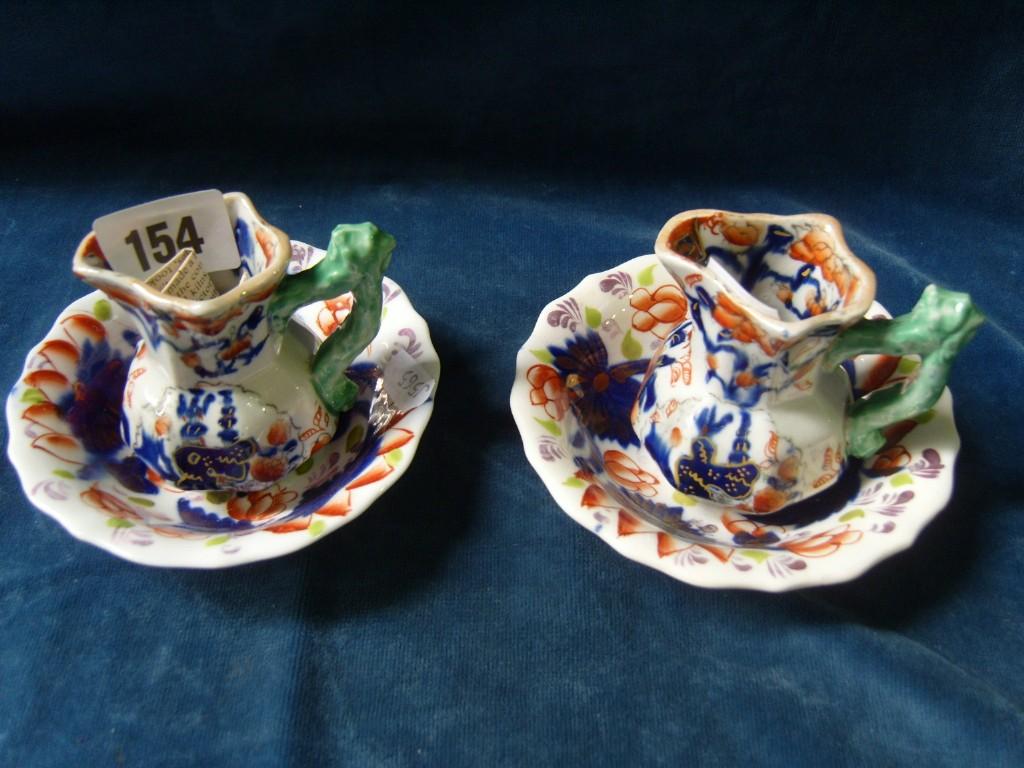 Appraisal: A pair of th century Masons Ironstone miniature ewers with