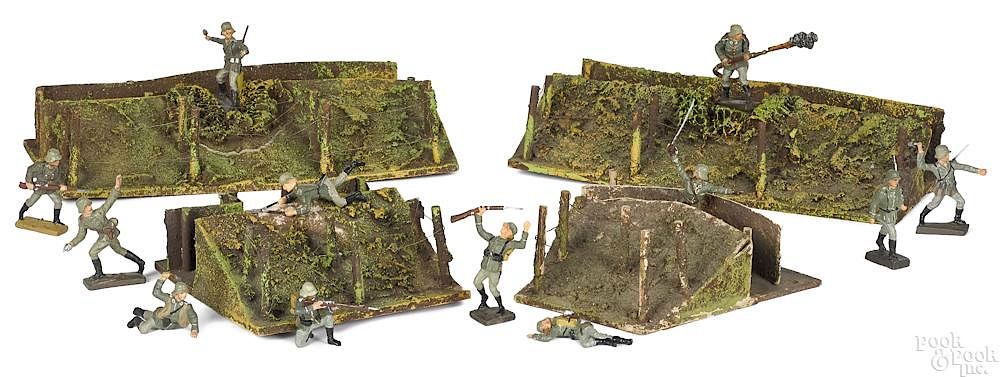 Appraisal: Lineol painted composition soldiers and trenches Lineol painted composition soldiers