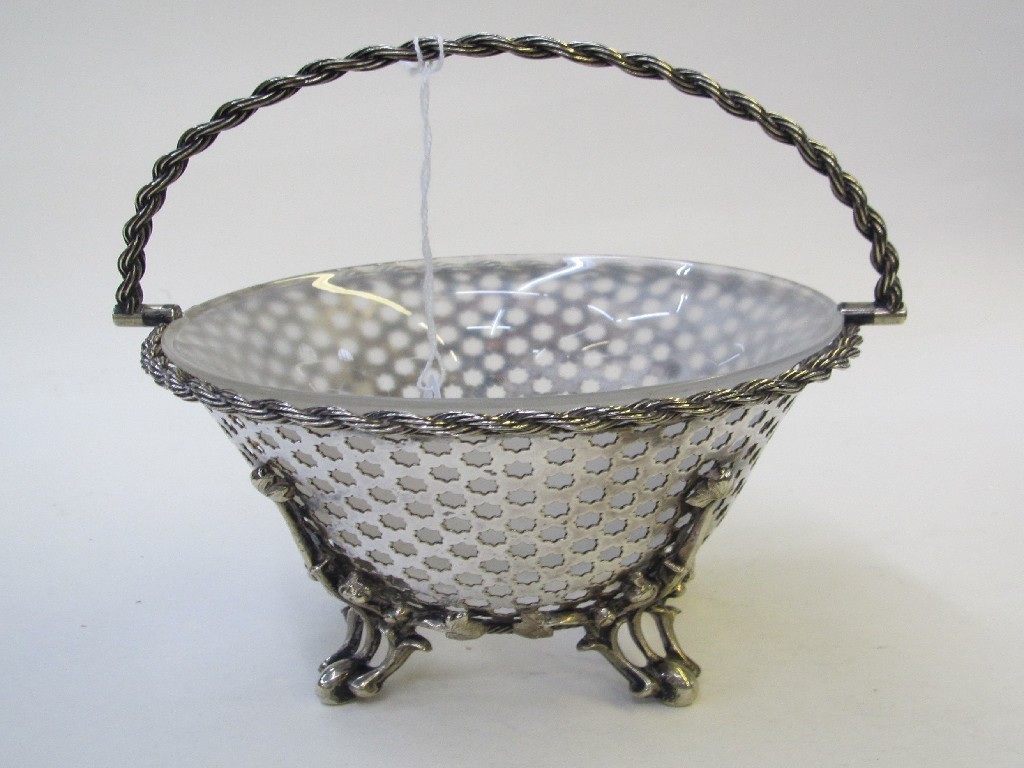 Appraisal: Silver plated sugar basket with opalescent glass liner