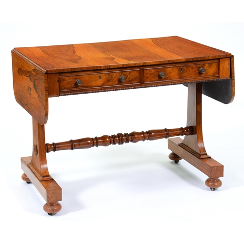 Appraisal: A George IV rosewood sofa table fitted with drawers and