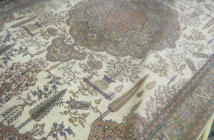 Appraisal: HAND KNOTTED TURKISH CARPET floral and central floral medallion design