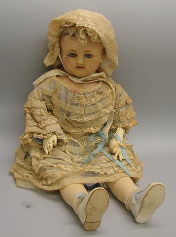 Appraisal: Poured wax shoulderhead doll Blue sleep eyes closed mouth Original