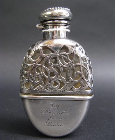 Appraisal: STERLING SILVER GLASS POCKET LIQUOR FLASK with Sterling overlay in