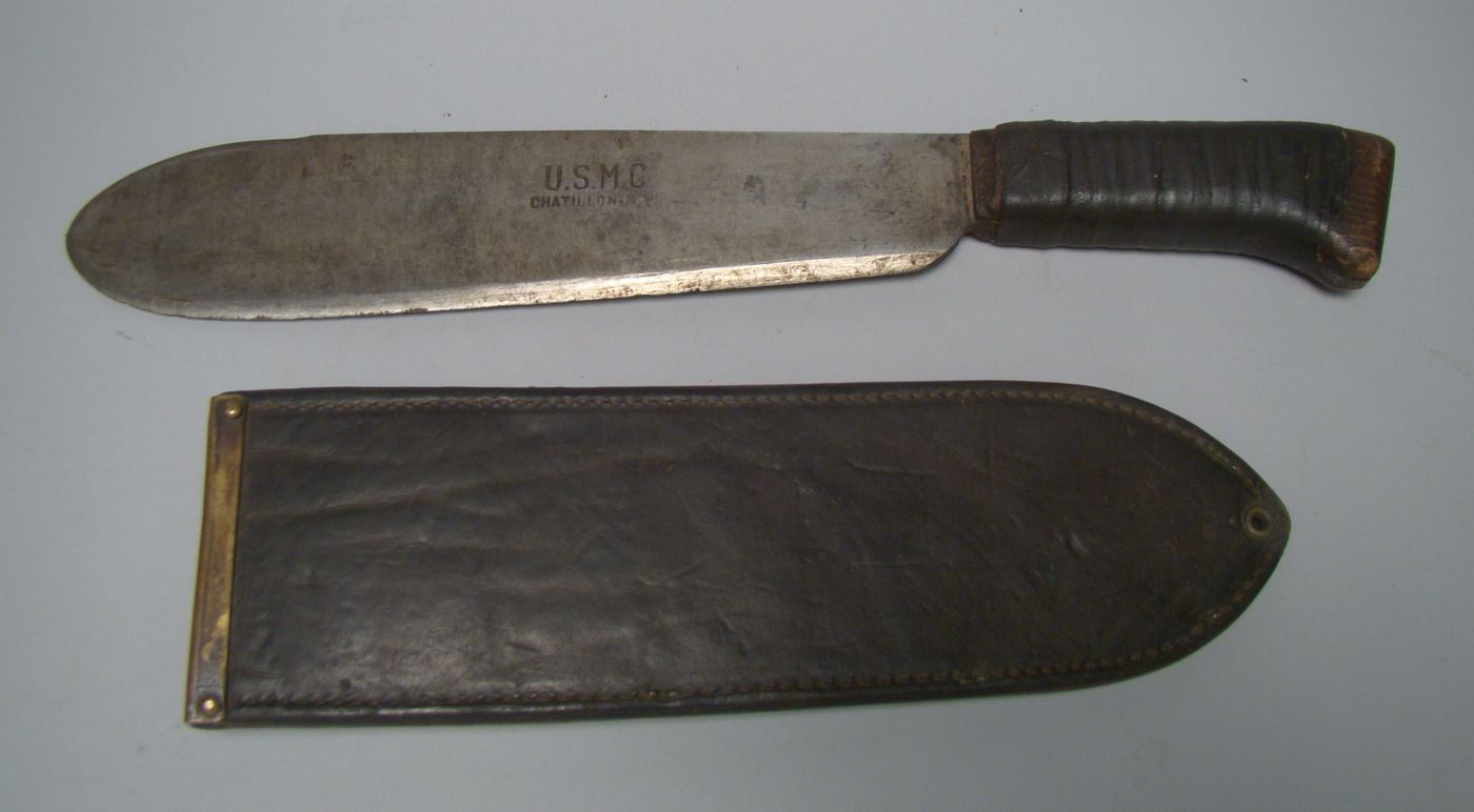 Appraisal: U S MARINE CORPS ENTRENCHING KNIFE AND SCABBARD Length of