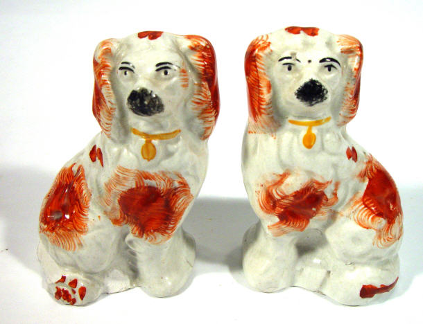 Appraisal: Pair of Victorian miniature Staffordshire spaniels with hand painted brown