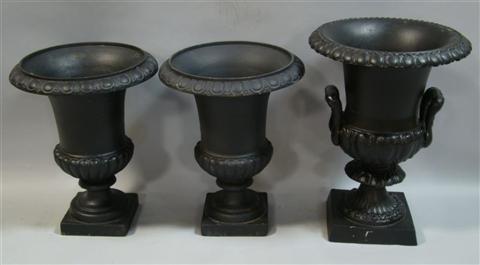 Appraisal: PAIR OF SMALL BLACK PAINTED CAST IRON URNS with everted