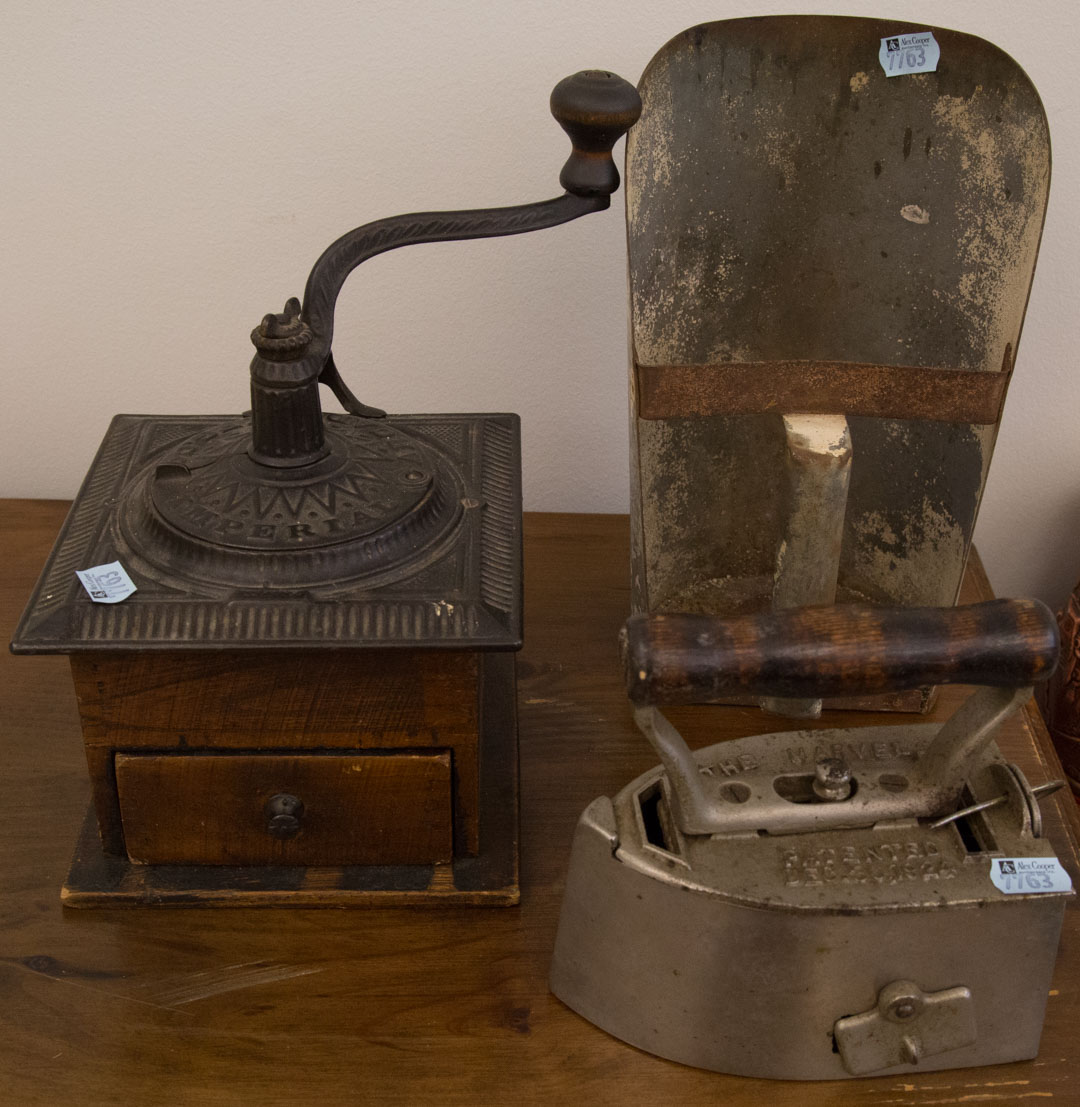 Appraisal: Three primitive items including iron coffee grinder and candle holders