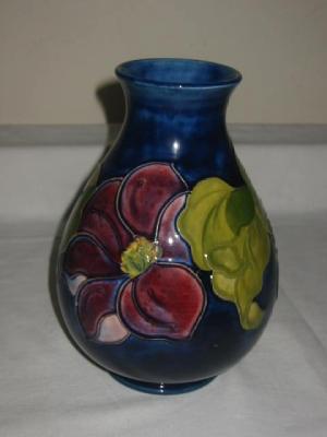 Appraisal: A WALTER MOORCROFT POTTERY VASE of bellied form tube lined