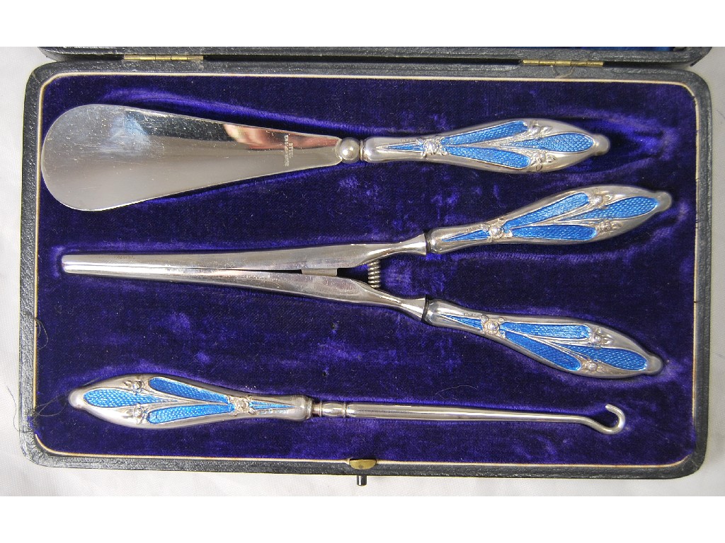 Appraisal: Art nouveau cased set of silver handled steel glove stretchers