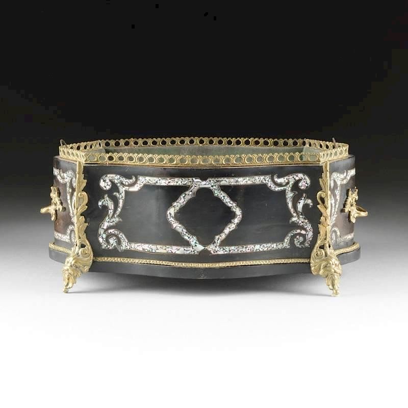 Appraisal: A NAPOLEON III EBONIZED WOOD MOTHER-OF-PEARL AND GILT BRONZE JARDINI