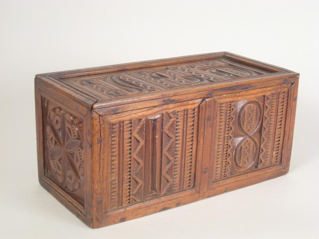 Appraisal: A th Century Norwegian type pine Box with sliding lid