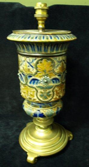 Appraisal: A Doulton stoneware lamp the flanged top incised lotus leaves