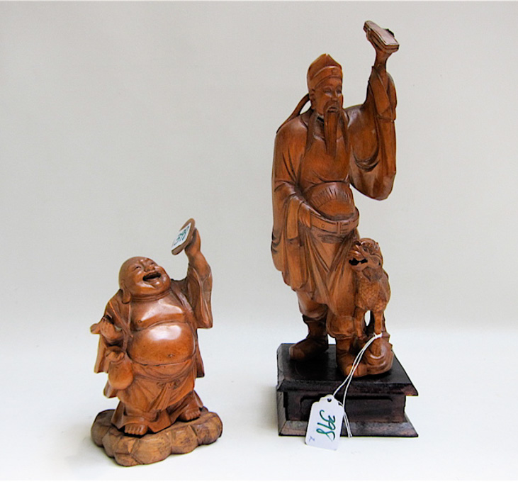 Appraisal: TWO JAPANESE WOOD CARVED FIGURES of a Buddha with cymbals