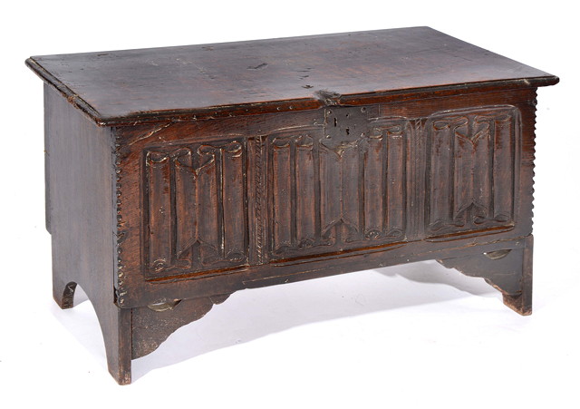 Appraisal: A SMALL LINENFOLD OAK COFFER with hinged rising lid iron