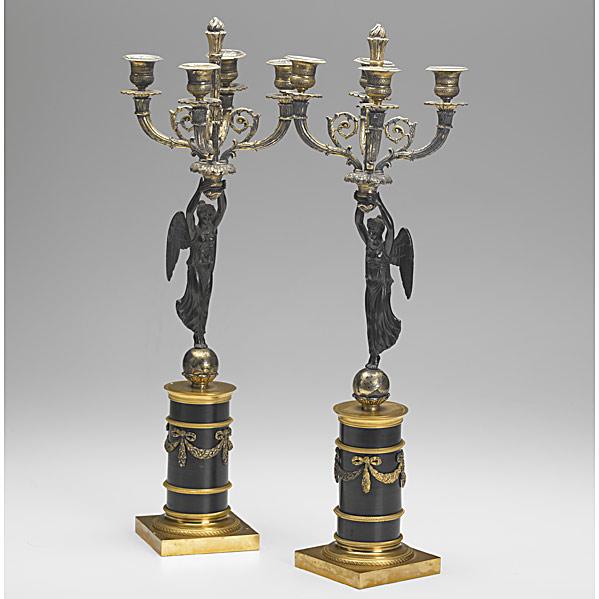 Appraisal: PAIR OF BRONZE CANDELABRAPatinated Winged Victory figures with dore decoration